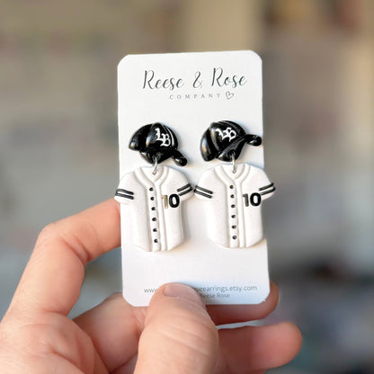 Reese & Rose Co. white polymer clay baseball jersey and hat earrings with black trim and number 10.